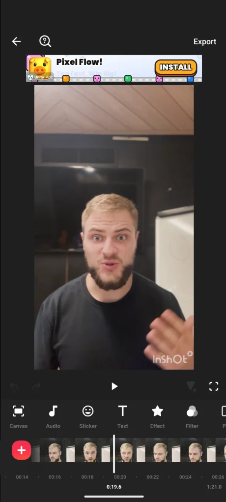 InShot free version on iPhone: a talking-head clip with an in-app ad banner above the preview and an InShot watermark in the corner of the video